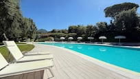 Beautiful pool area and poolside bar staff