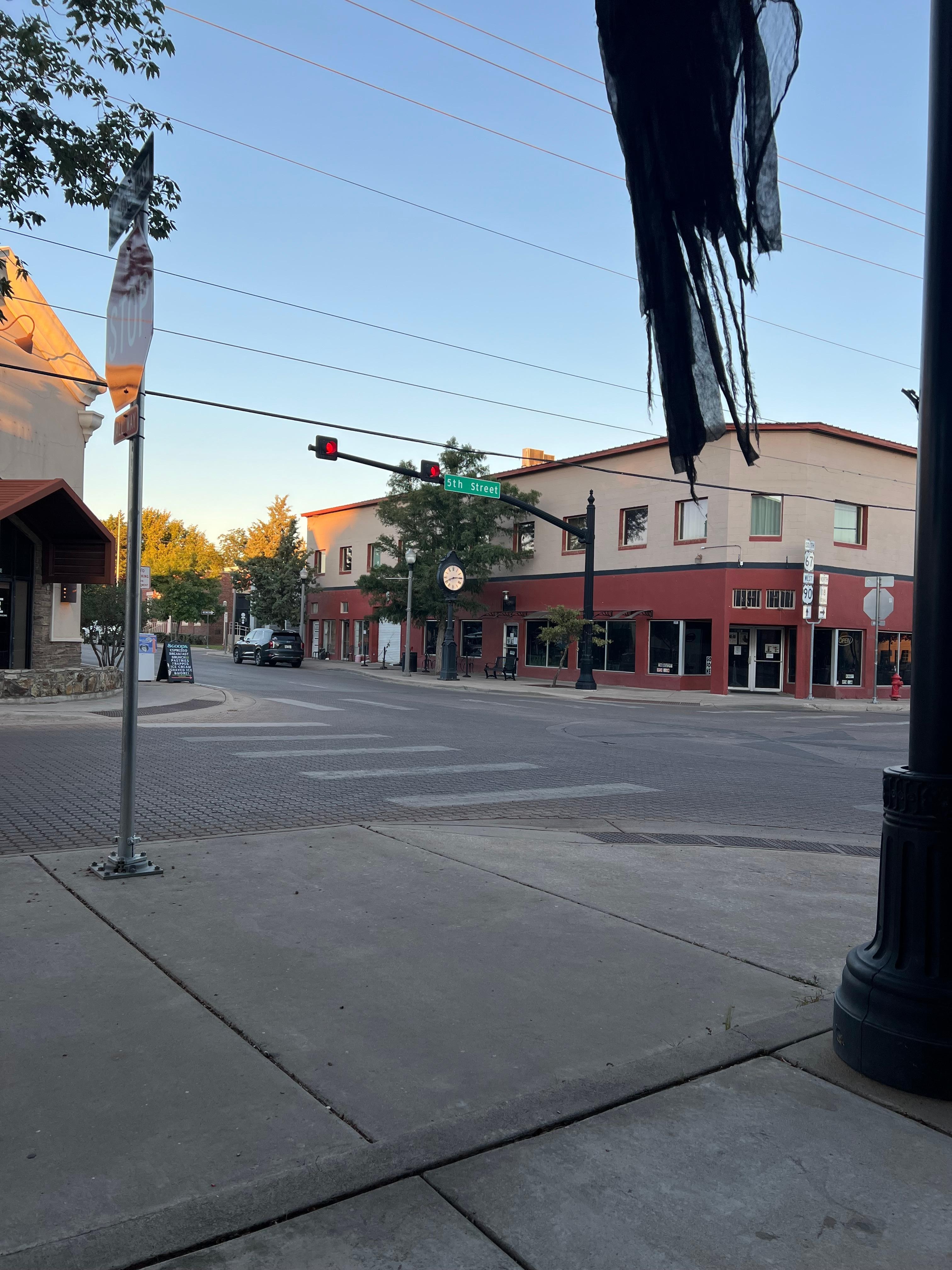 Exterior of building the rooms are on 2nd floor bar is below