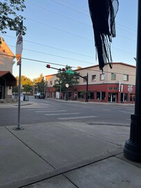 Exterior of building the rooms are on 2nd floor bar is below