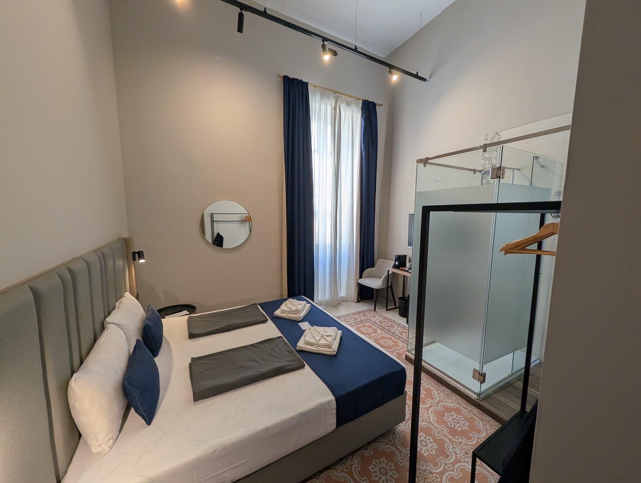 Double room with a n open aspect to the front. See through shower in room 