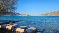 View of Spinalonga Island from the beach