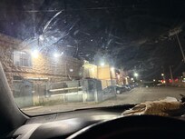 The car parked next to rhe fenced area was where the kid was smoking pit