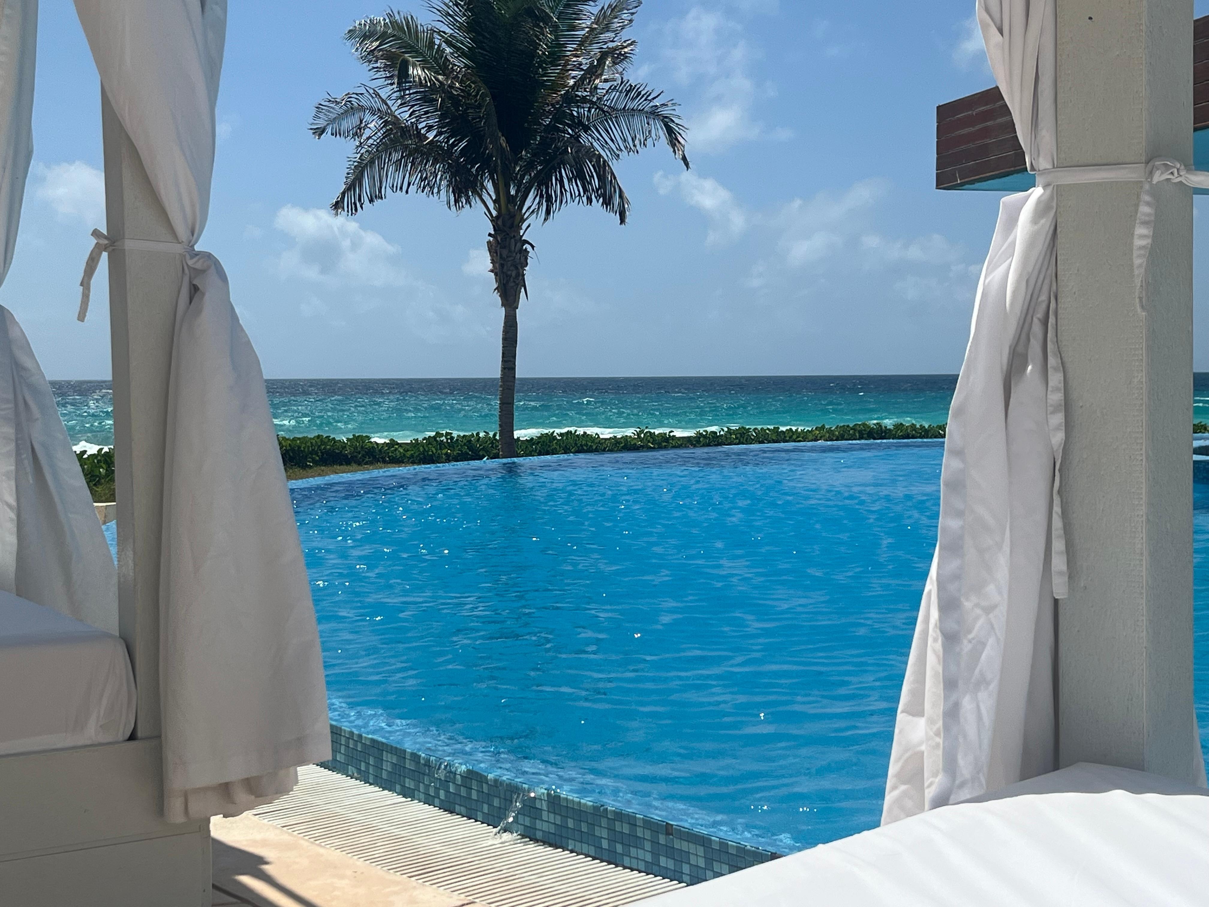 Lounge area by infinity pool