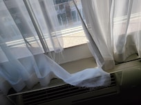 Torn window sheer