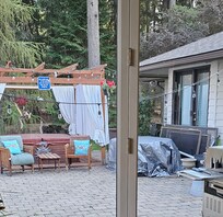 Hot tub in reality. Right next to their window with no privacy at all. Looks nothing like the website