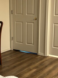 Photo of connecting door. If I had got down on the floor I could have seen in the other room