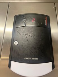 Elevator panel just scratched up and left to rot