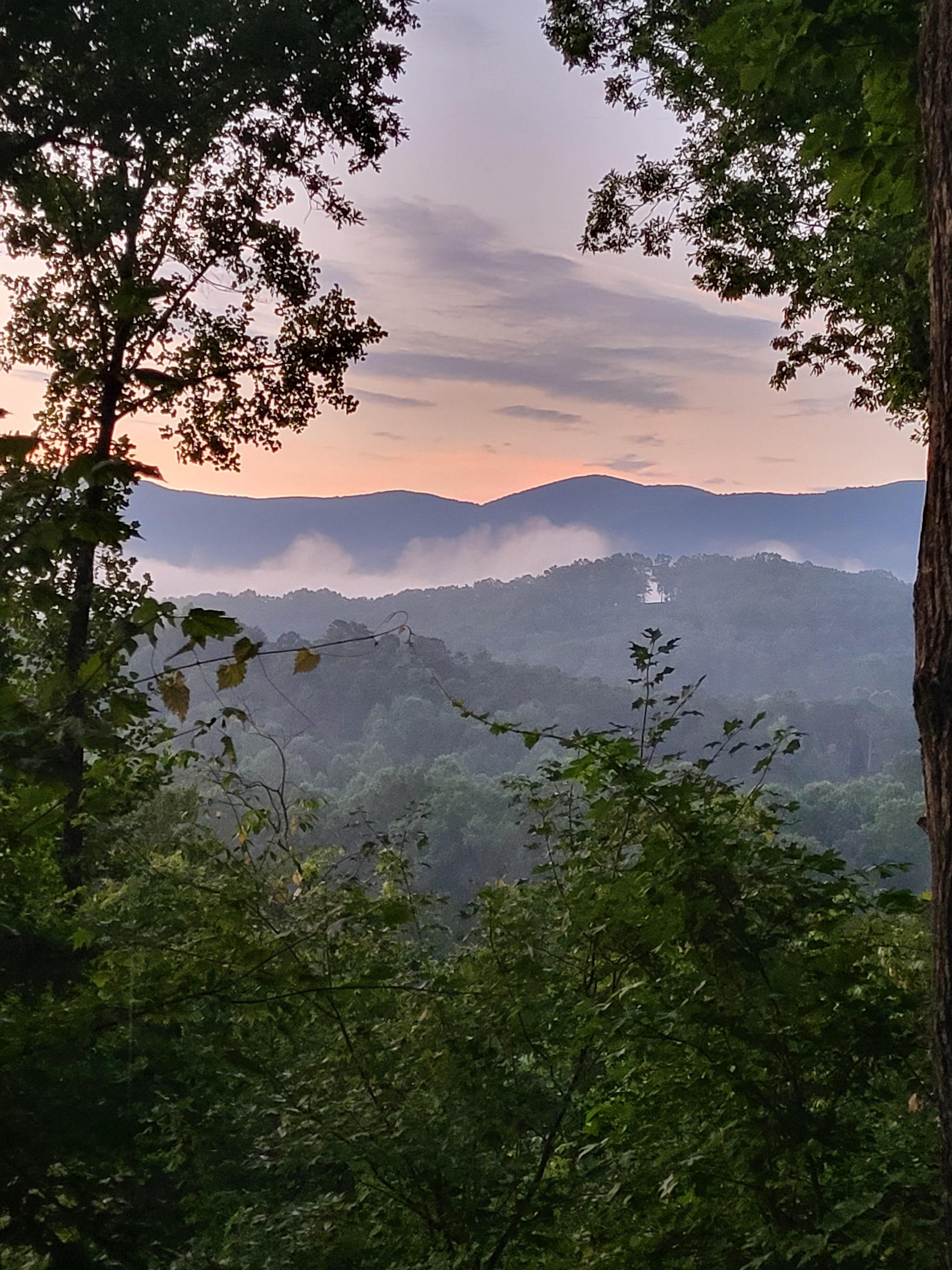 Sunrise over valley in neighborhood.