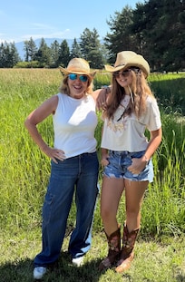 Ready for the festival! Standing in driveway of the cabin