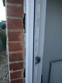 Missing mortar around front door