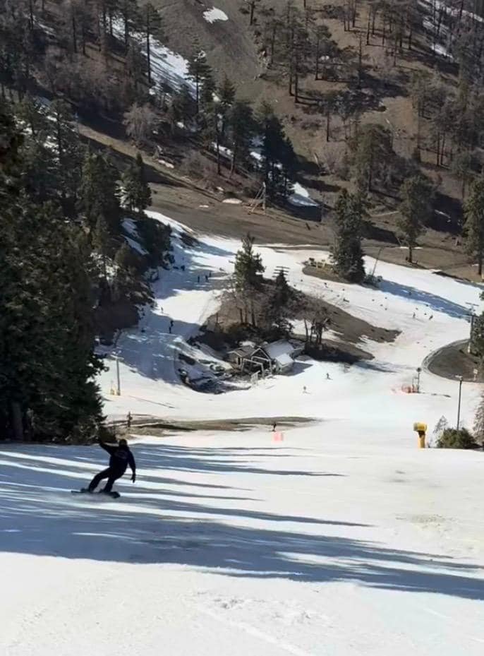 Dad, 67 years old boarding down the mountain. 