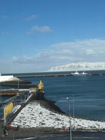 Morning view of icy cliffs across the bay.