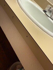 The counter trim was nailed into place.