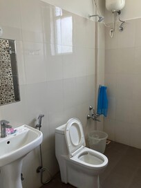 Bathroom is spacious and floor is anti slip (safe) not like slippery marble floor.