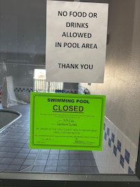 Sign stating when this pool was closed yet not disclosed when booking.