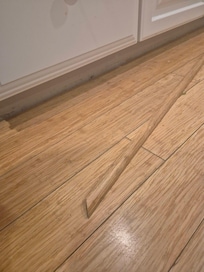 trim was sticking out from under kitchen sink