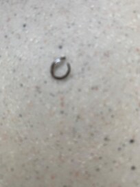 Nasty sharp tack stood on. Embedded in carpet