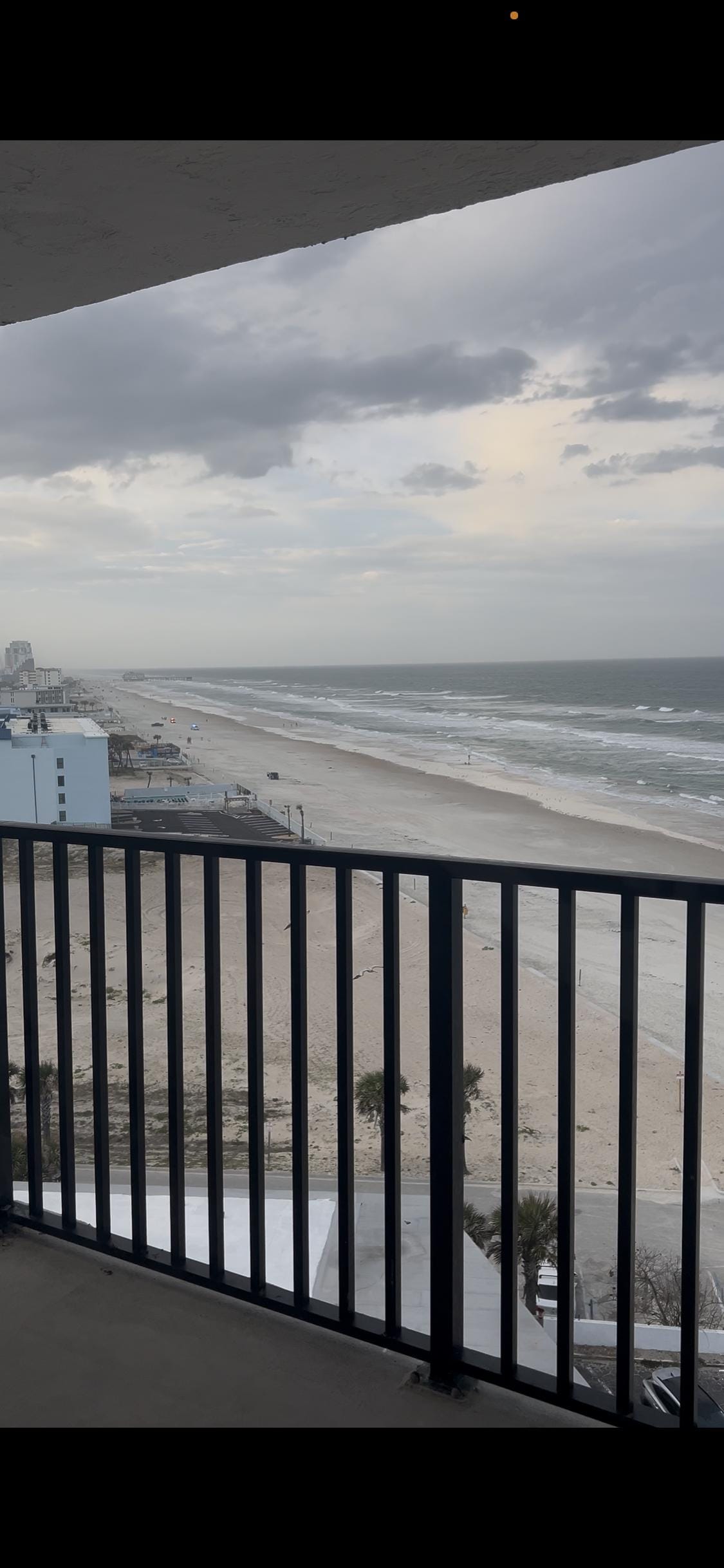 Balcony view partial city/beach view