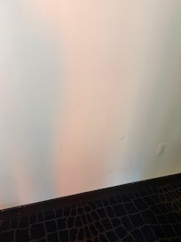 Scratches and stains on wall