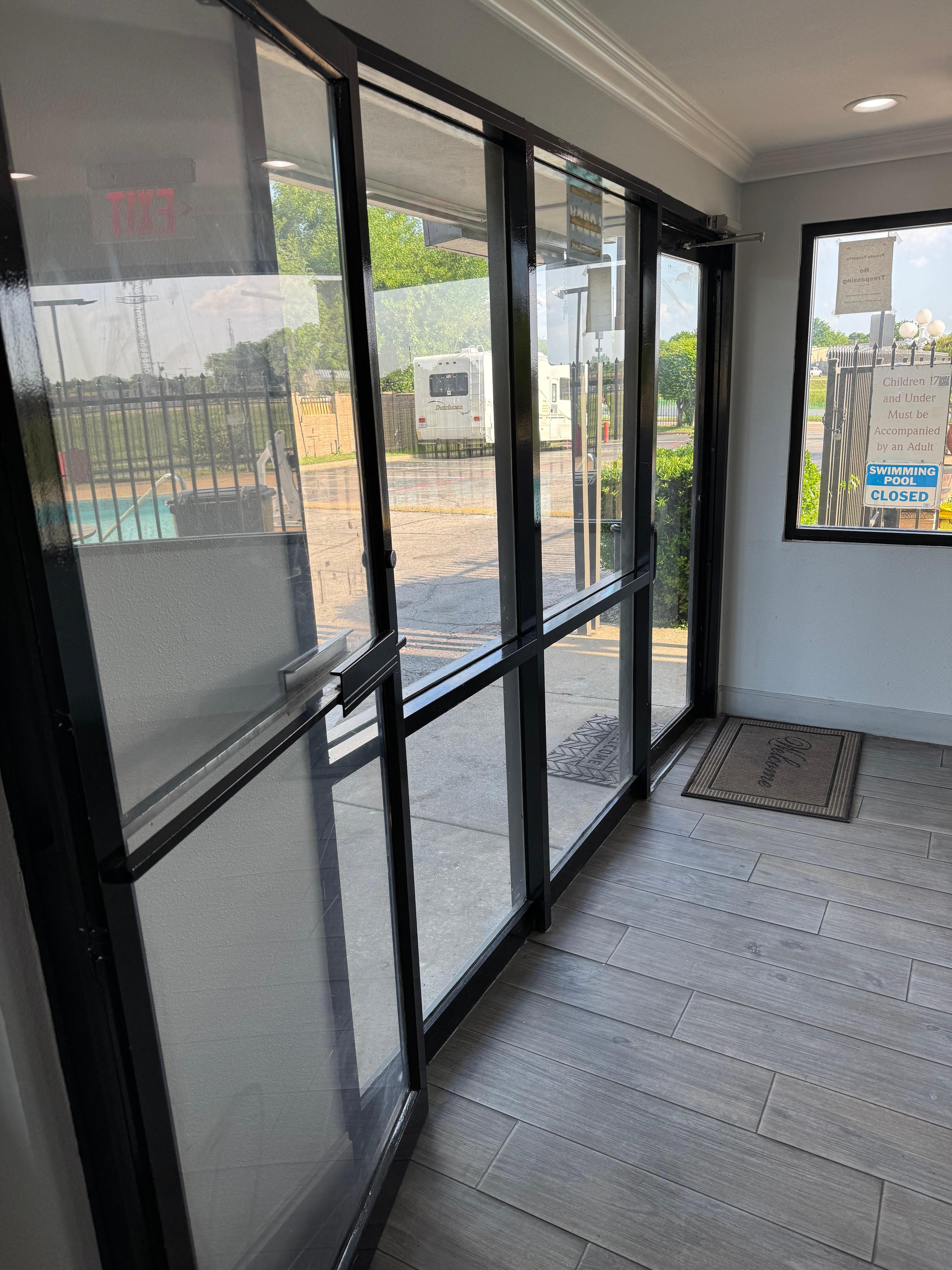 This is the office and you can see reflected parking spot they made me park on!