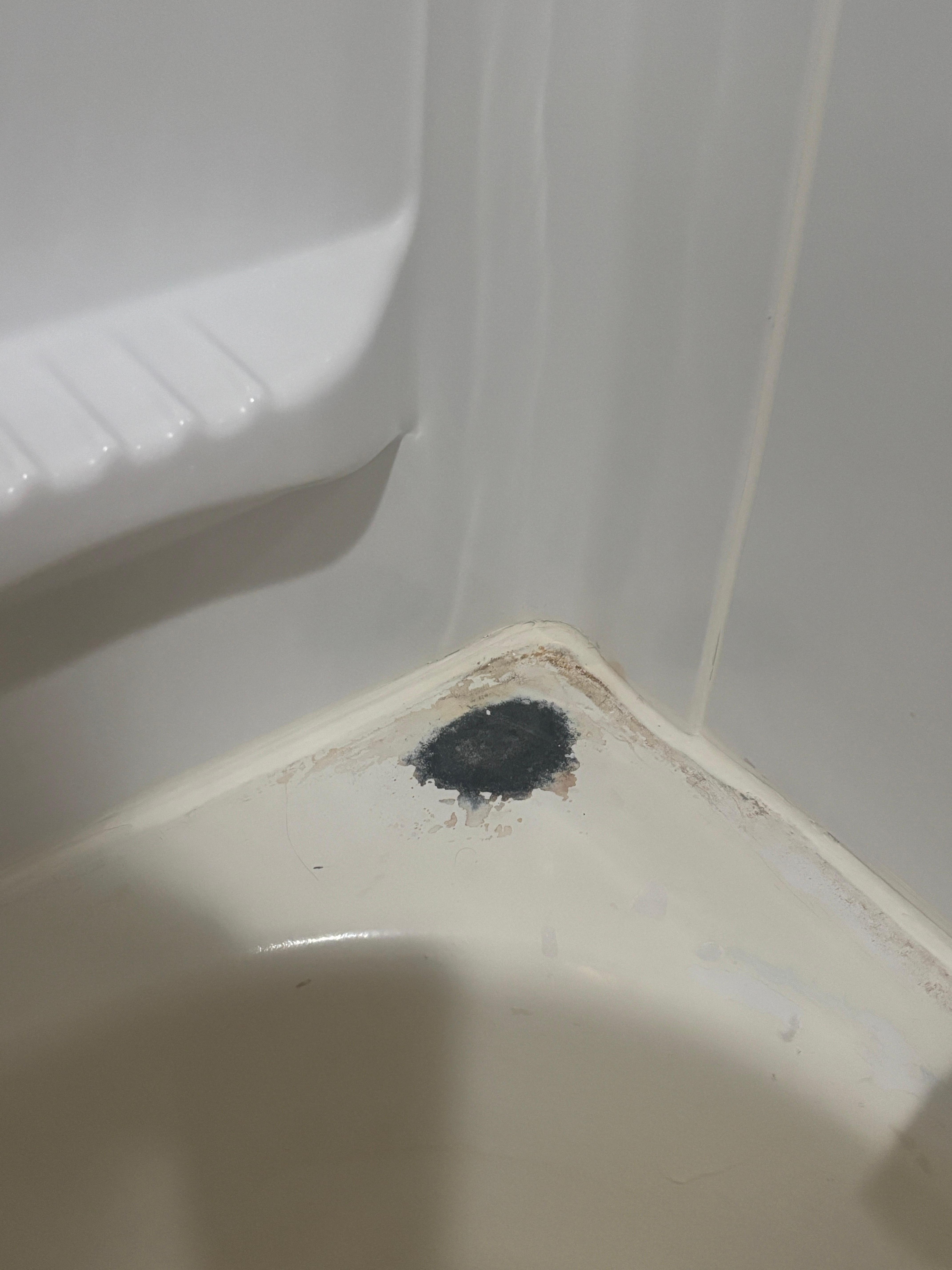 Black burn on shower