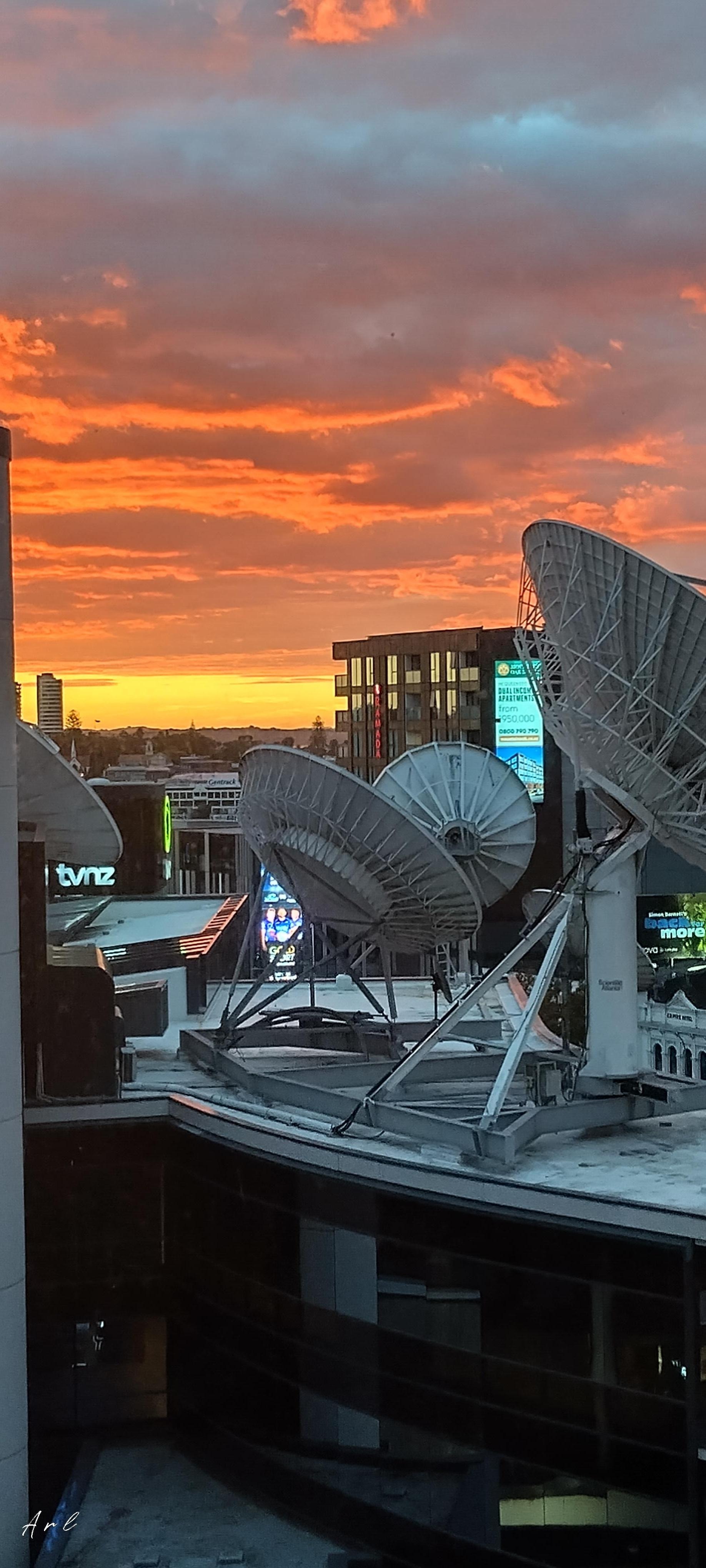 View from hotel bedroom of TV station satellite dishes