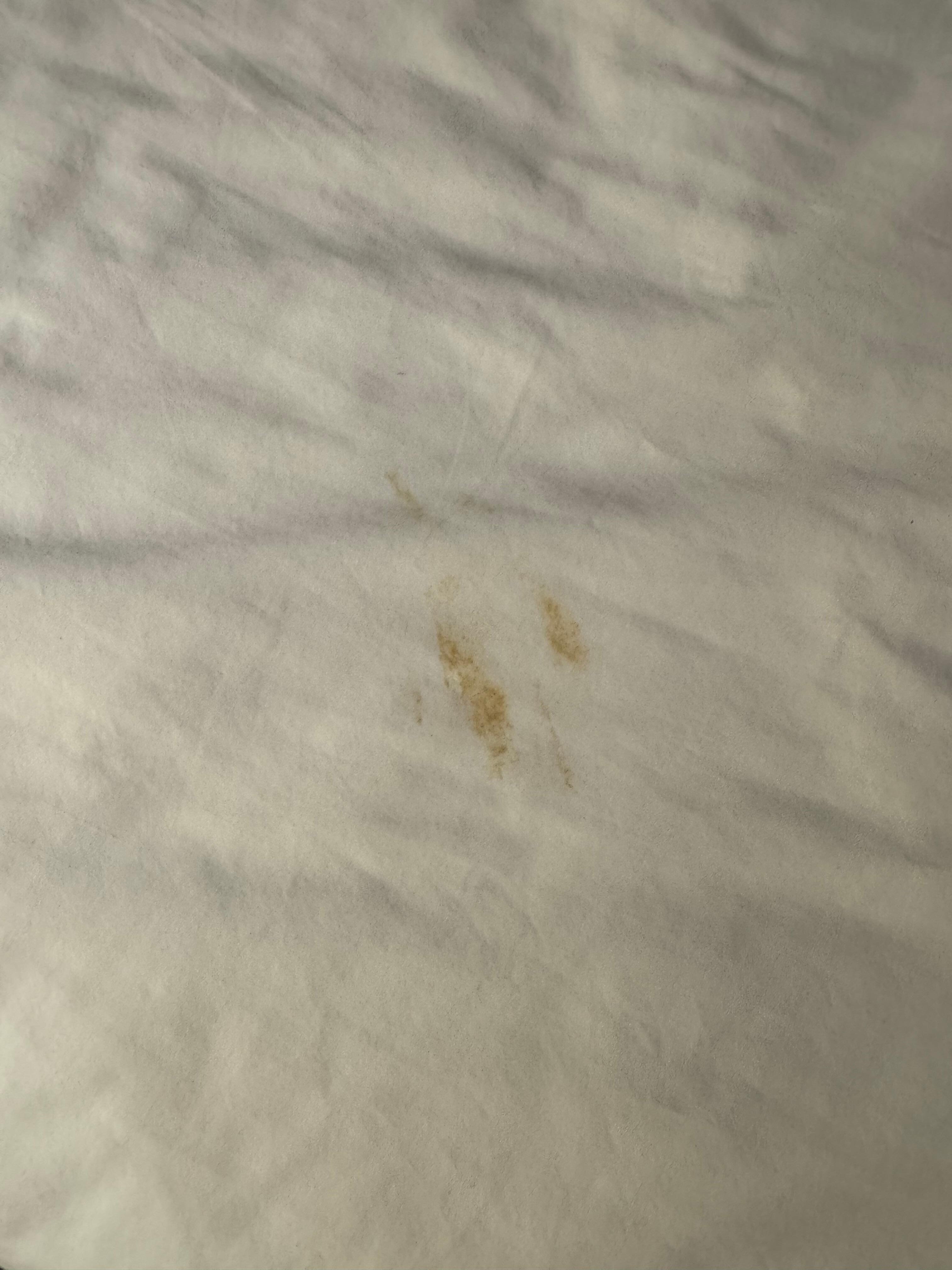 Brown stains on sheets