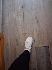 Very fragile flooring in main bedroom leading into bathroom. Not repaired.