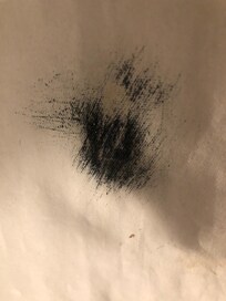 Large black spot on room darkening curtain