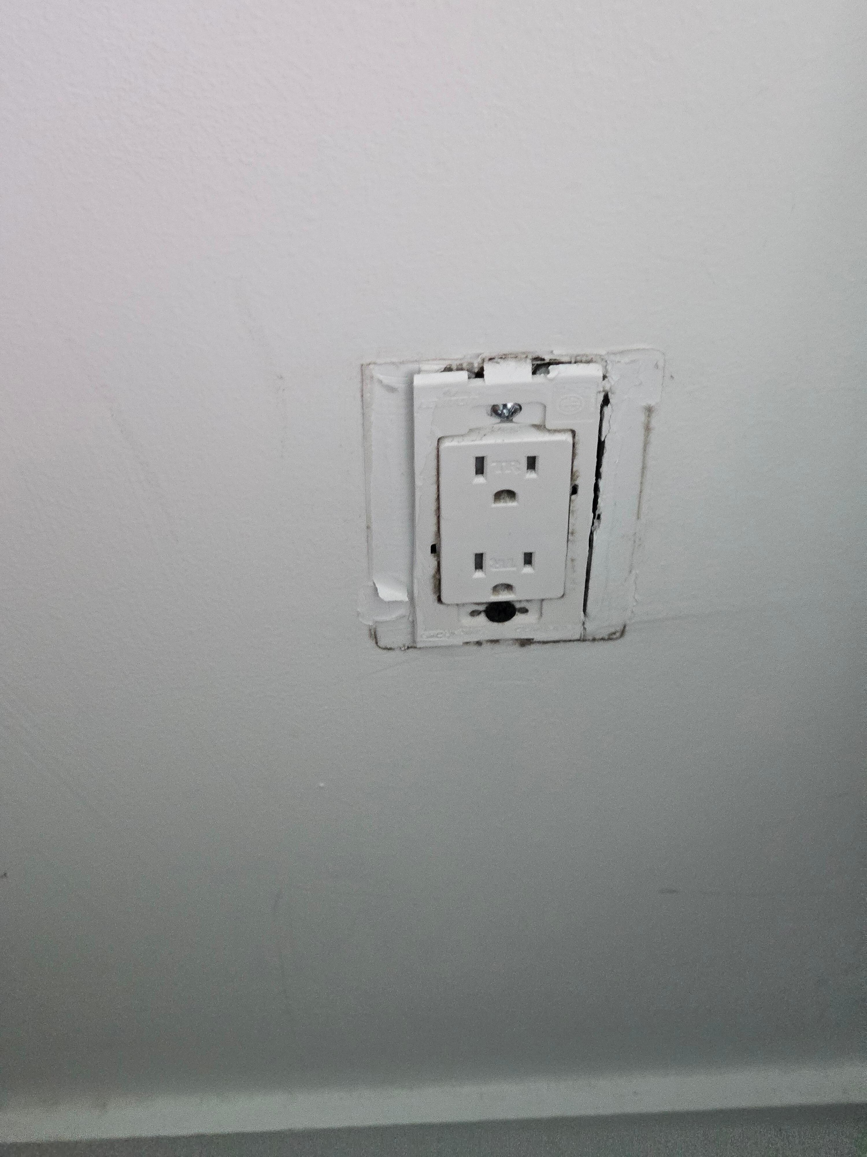 One of the 3 outlets with a cover missing. 