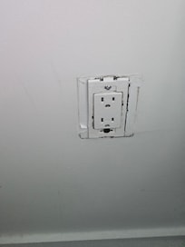 One of the 3 outlets with a cover missing.