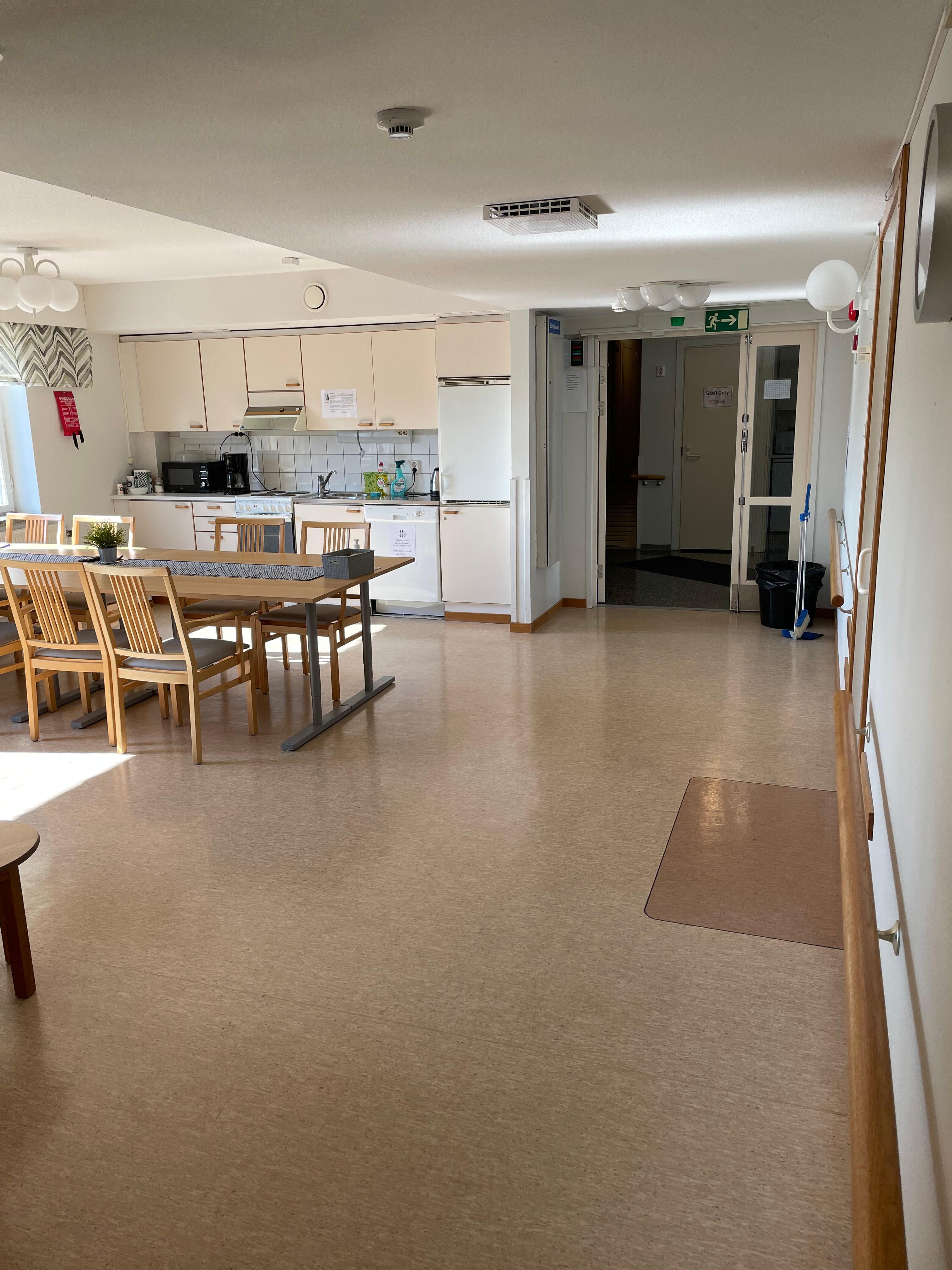 The public kitchen area in the floor, each floor (four in total) has two wings with four rooms each, with a public space in each wing. Spacious!