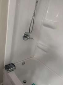 NO BATH SPOUT to run water into tub!! Capped off.