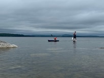 Kids enjoying the kayak and paddleboard