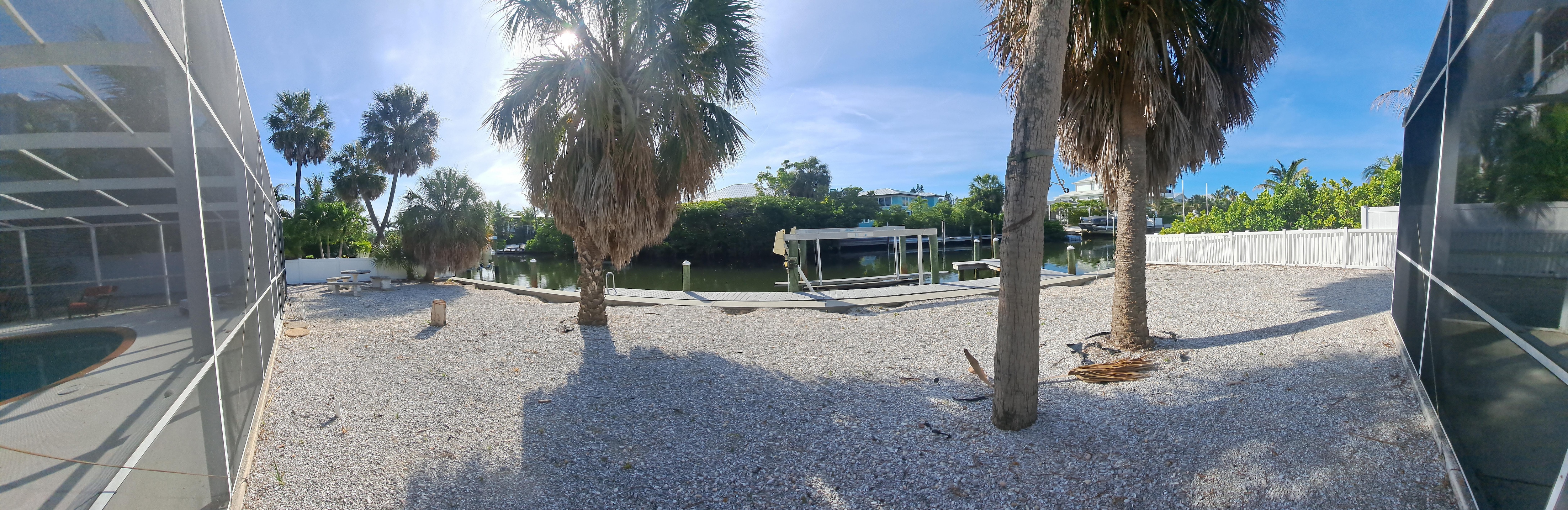 Canal behind home with Dock and lift