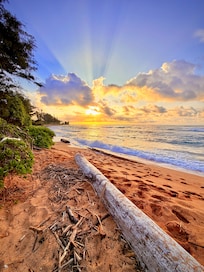Beautiful sunrises yards away from your ground level lanai.