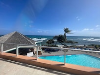 The pool overlooks the ocean