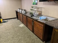 Notice the broken cabinets and big dried up pancake batter on the floor