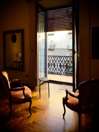 Soft light filters into each of bedrooms and kitchen from the large French doors.