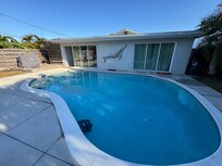 Wonderful pool and backyard area with afternoon sun.