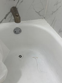 No plug for tub, had to use old
Plastic device provided