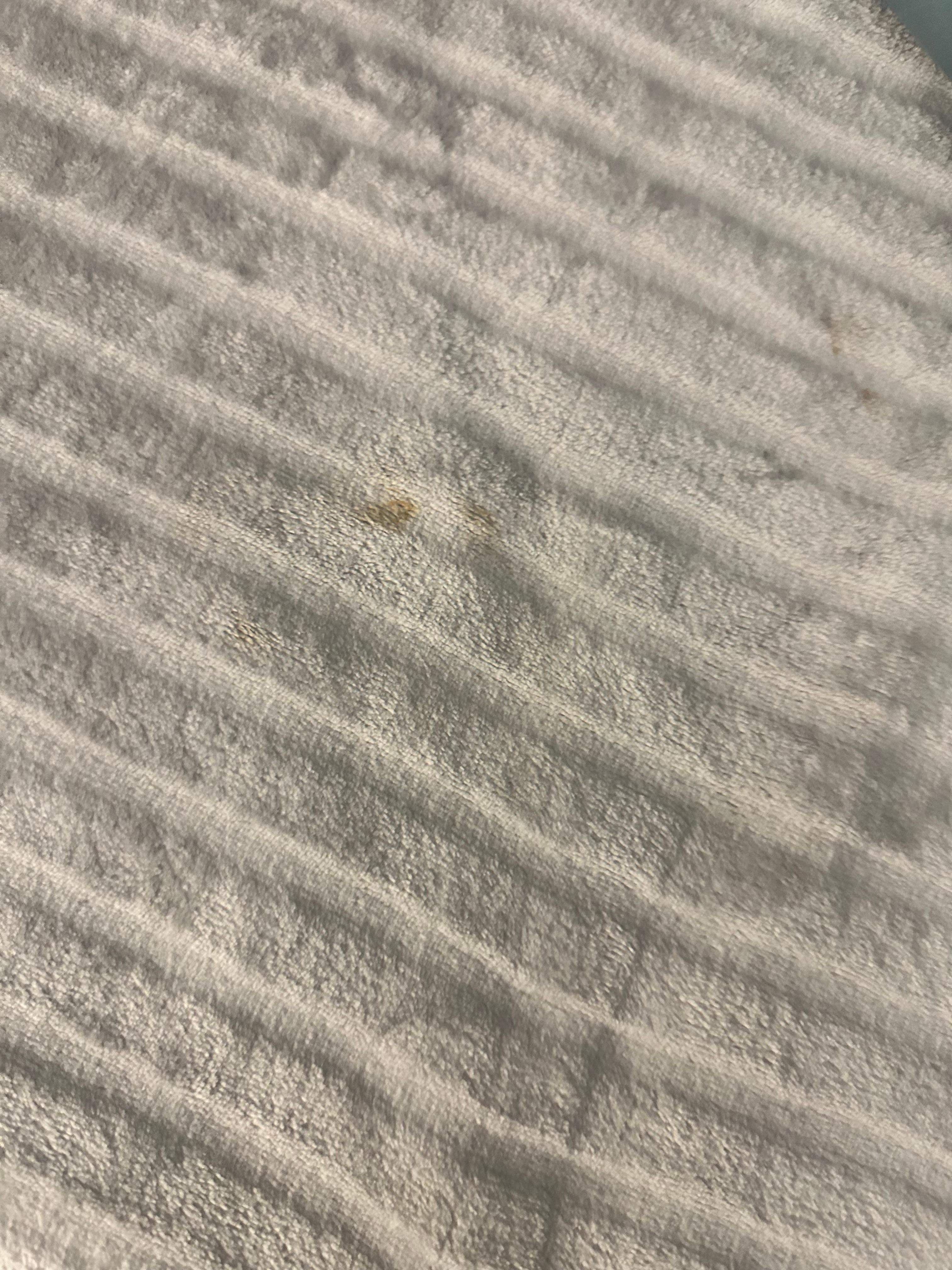 Linen on the bedding in the downstairs room with the balcony 