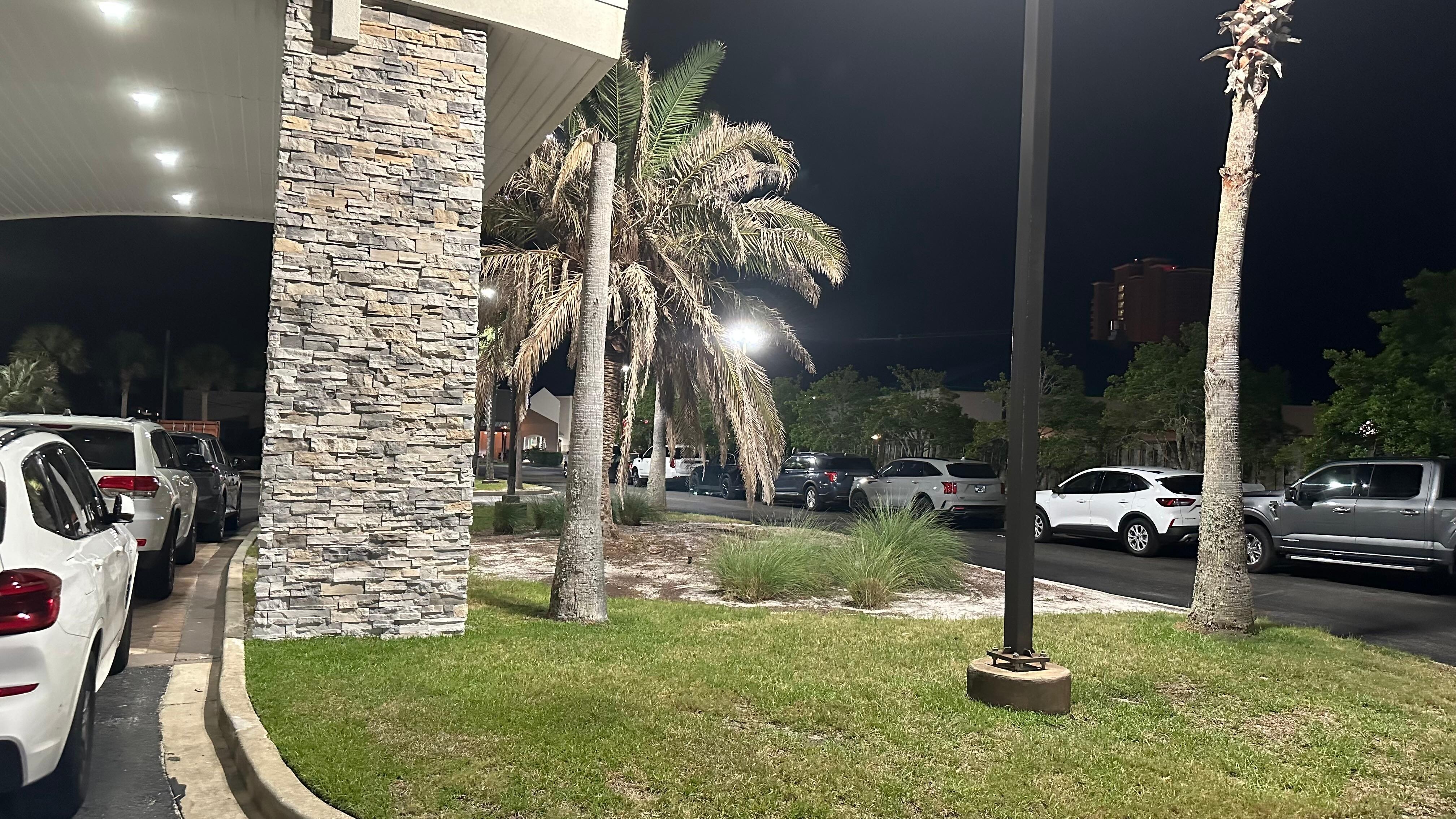 Cars parked down the entire side of the road 