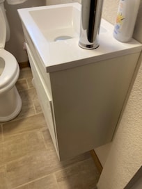 Was I on a airplane with small sink, interesting when 1 to 6 need to brush there teeth or wash face and drop off the side