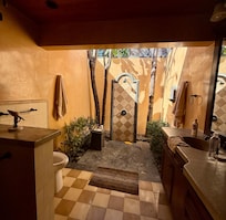 Cool outdoor showers in each bathroom