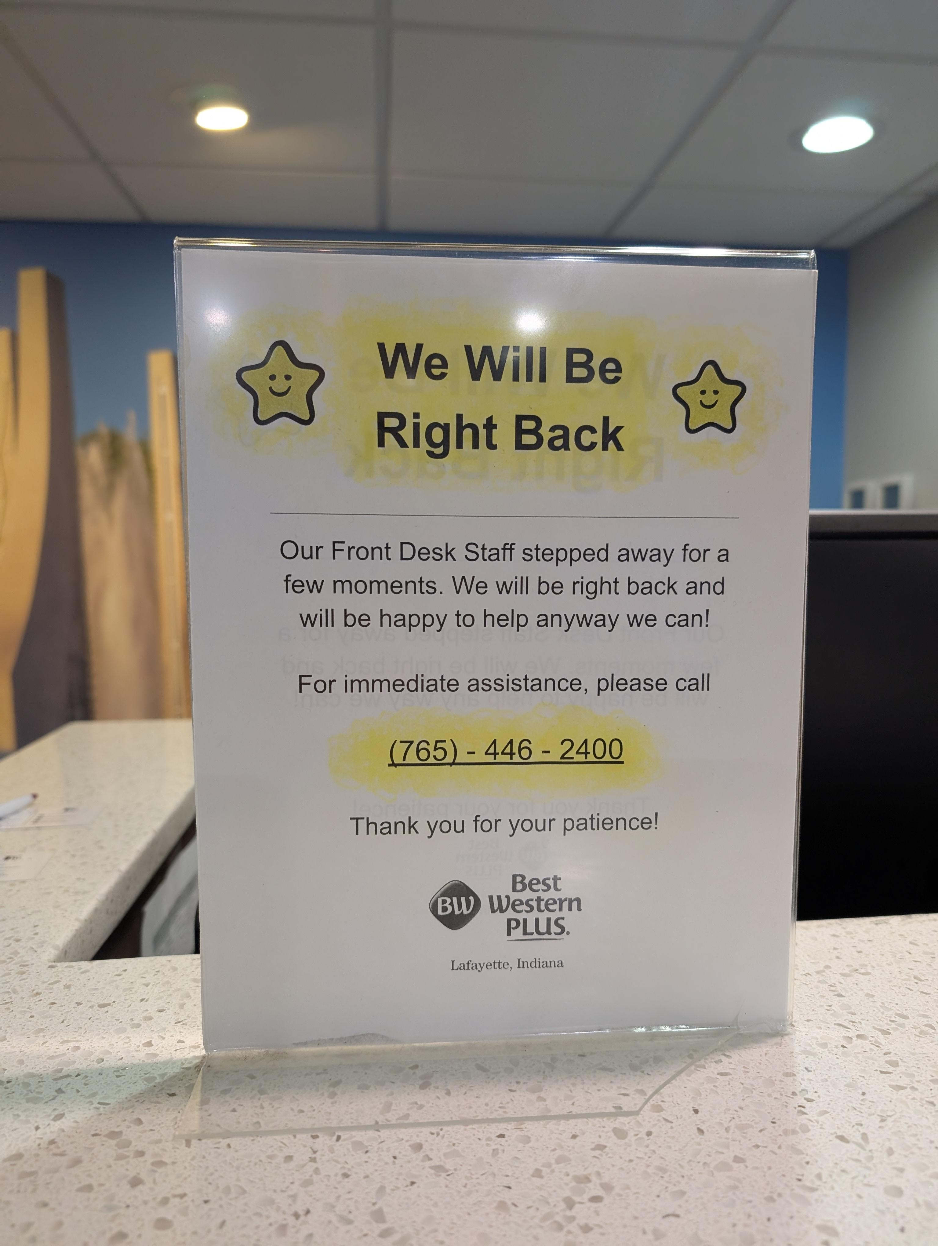 Sign stating staff stepped away