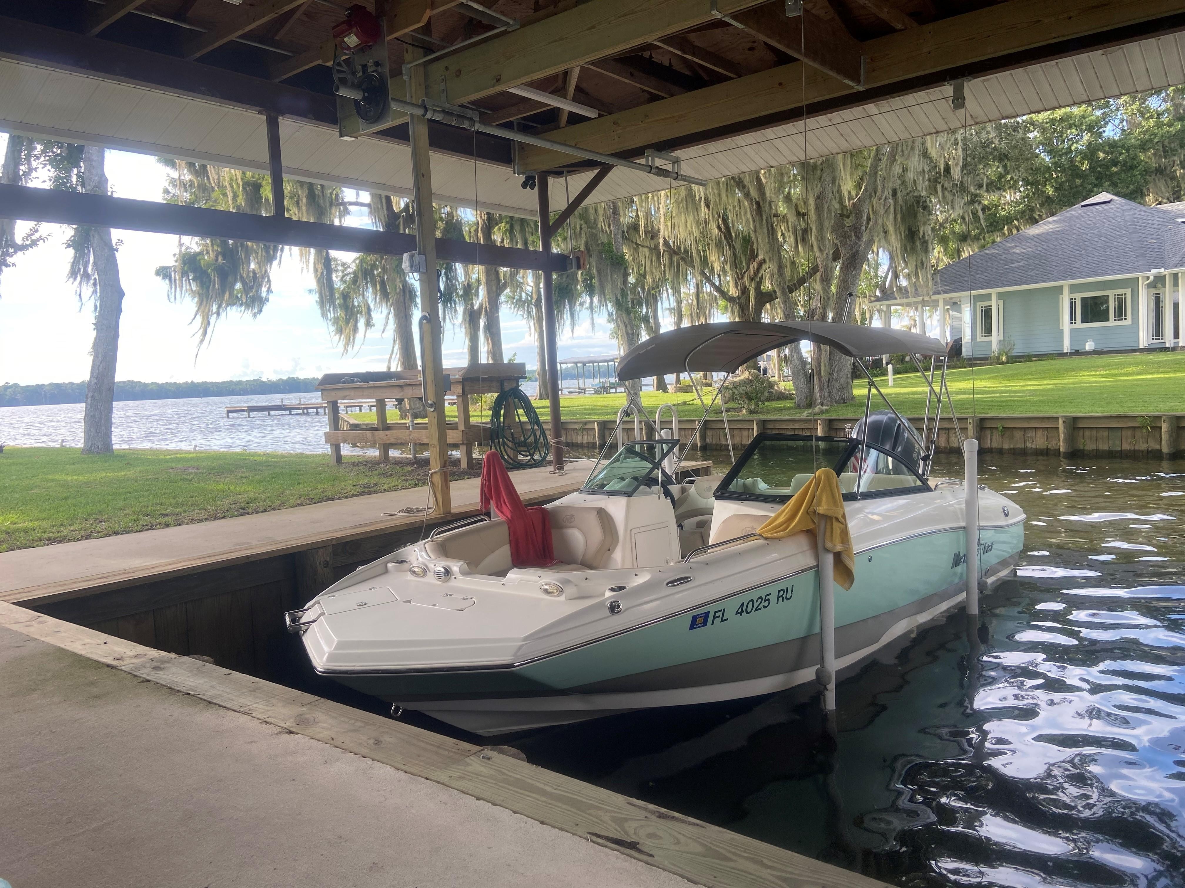 20' Boat under cover. 