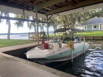 20' Boat under cover.