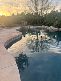 Pool at sunset .