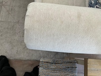 The arms and furniture were very dirty. This is the arm of the chair. The whole thing was filthy. Throw pillows were dirty. Everything was dirty stained and smelly.
